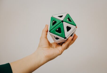 person holding cube printed on 3d printer