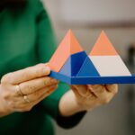 person holding pyramids