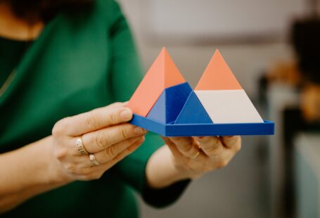 person holding pyramids