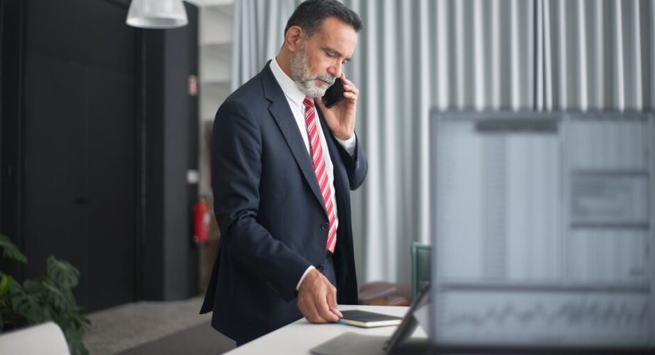 man-wearing-black-suit-in-the-office